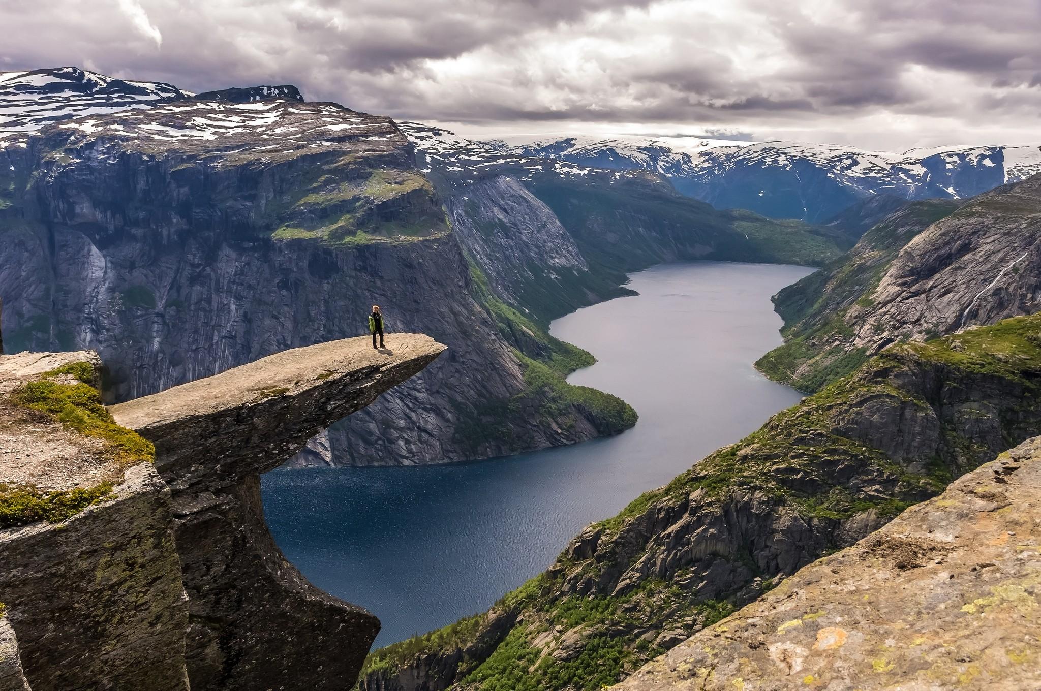 2048x1360 Nature Photography Landscape Fjord Canyon Rocks Snow Clouds Cliff Women Hiking Stone Norway Trolltun Wallpaper:2048x1360