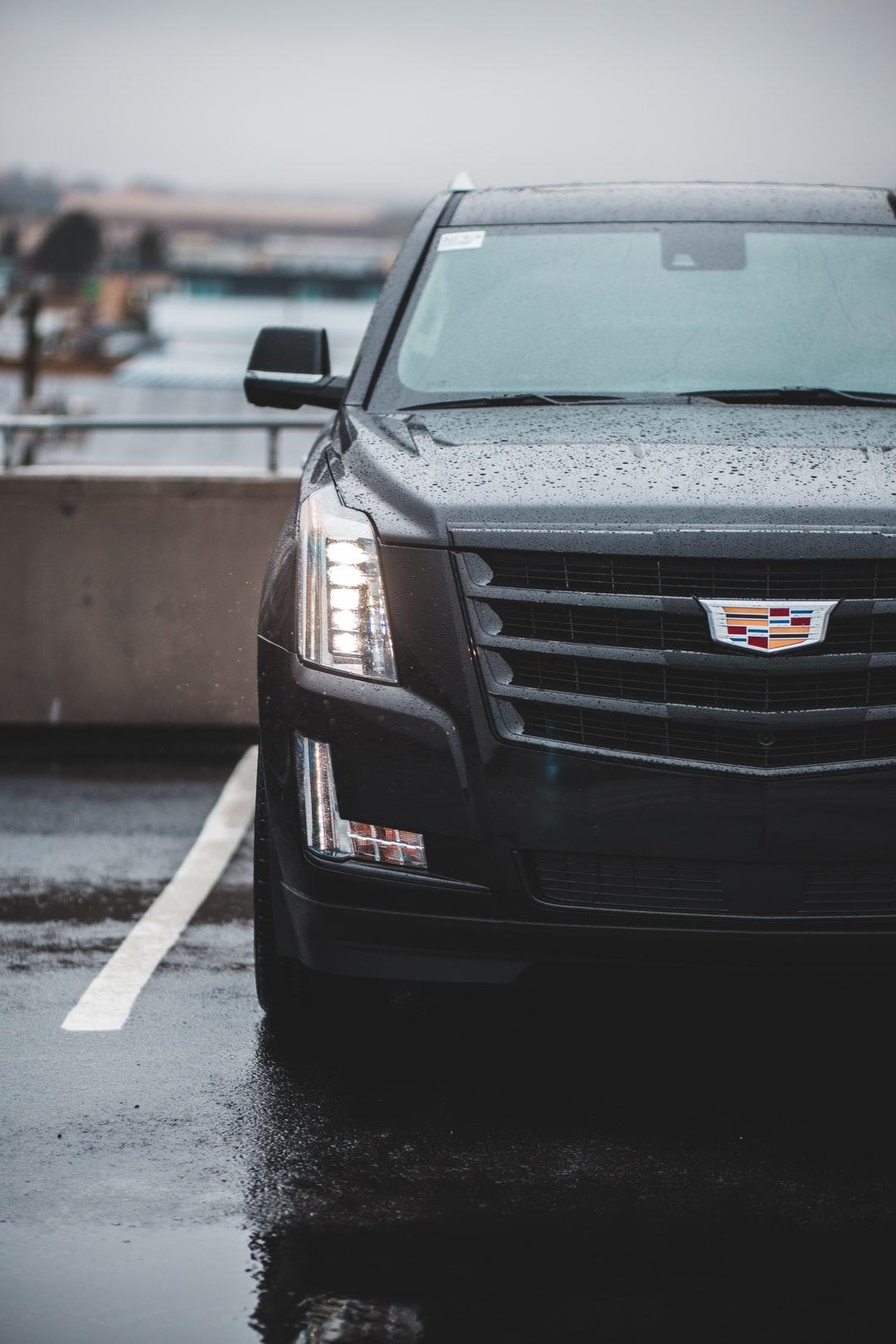 1080x1620 black Cadillac car photo