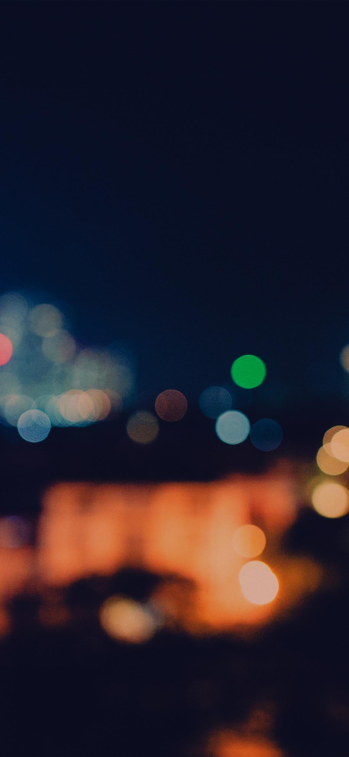 1125x2436 Bokeh City Night Light Art Blue Pattern Dark Wallpaper