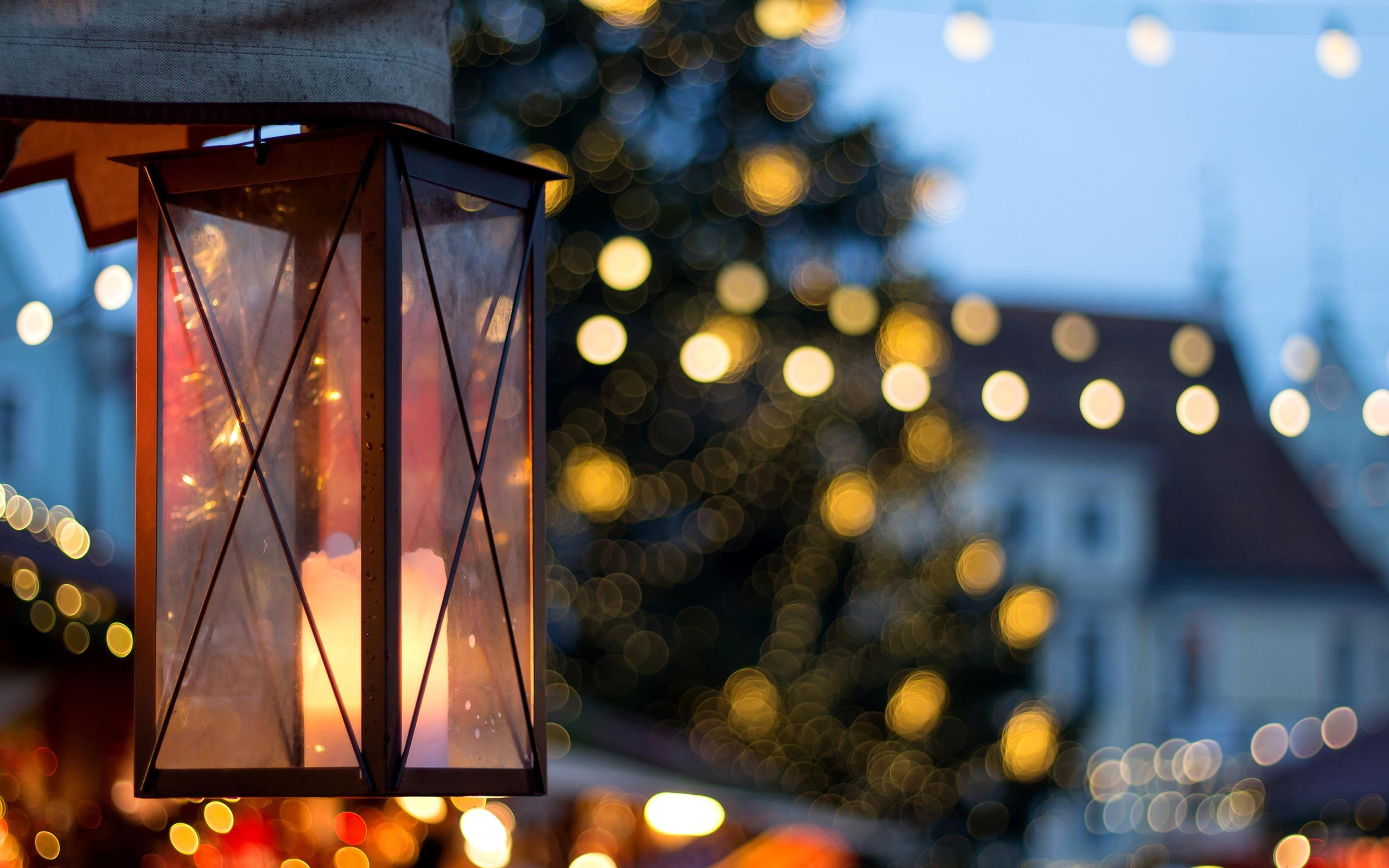 2560x1600 Merry Christmas Lantern City Lights Bokeh Photography Wallpaper