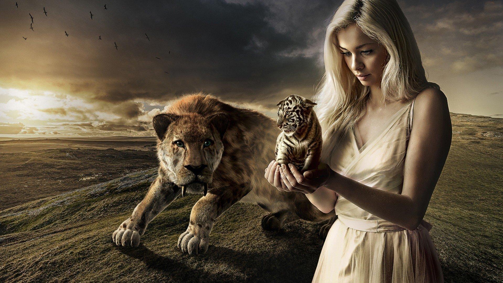1918x1080 a prehistoric tiger meets a baby tiger Wallpaper and Background Imagex1080