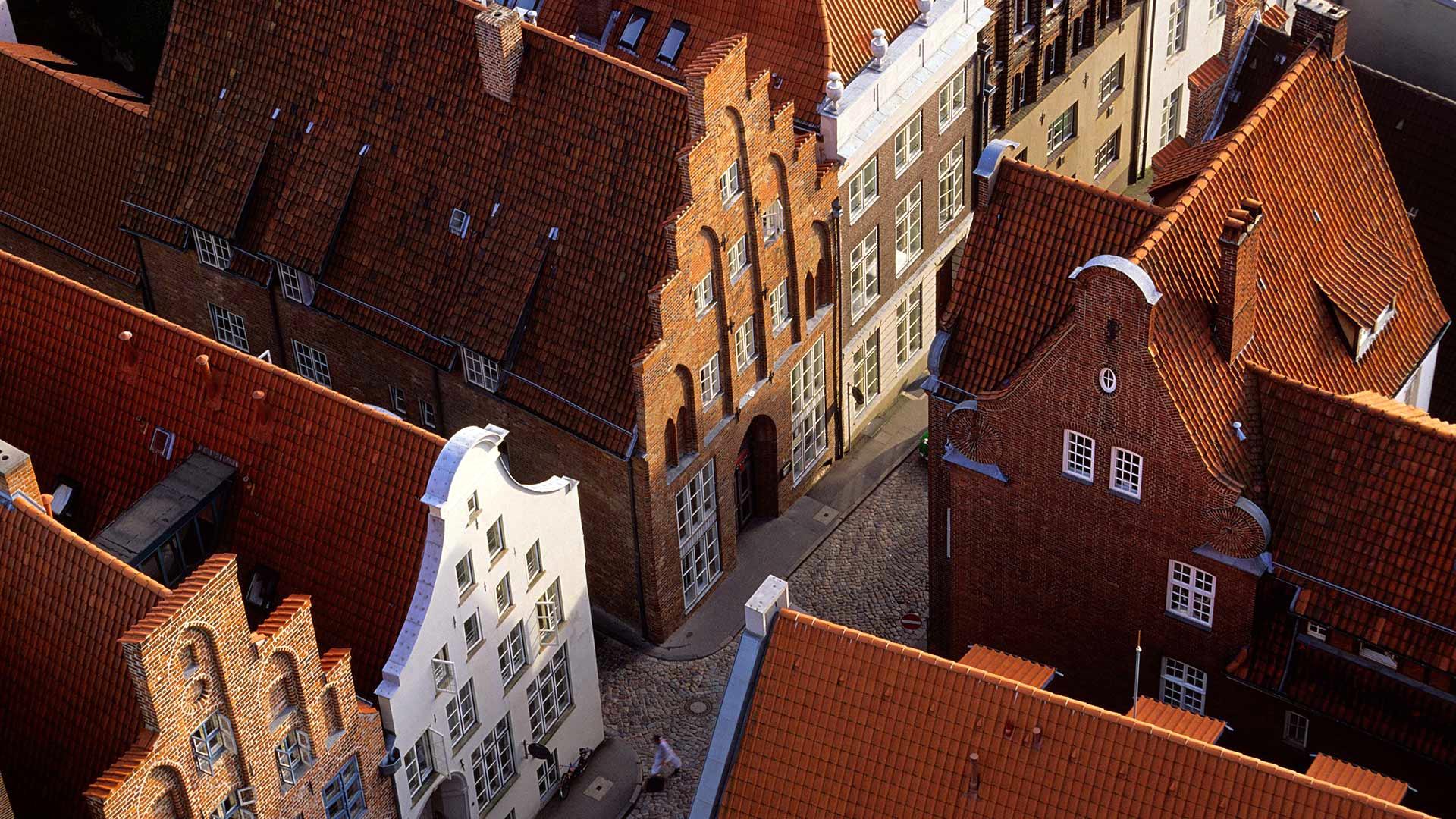 1920x1080 Wallpaper Germany, Lubeck, roof, street, houses, city 1920x1080 Full HD 2K Picture, Image