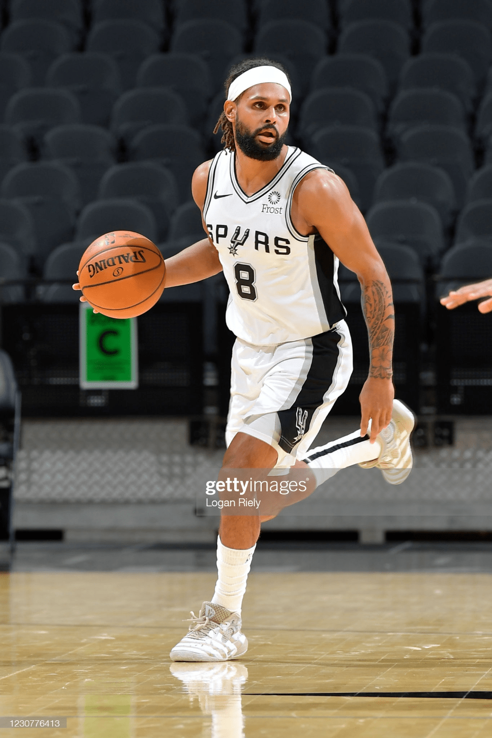 1000x1500 Patty Mills of the San Antonio Spurs handles the ball during the game. San antonio spurs, Patty mills, Spurs