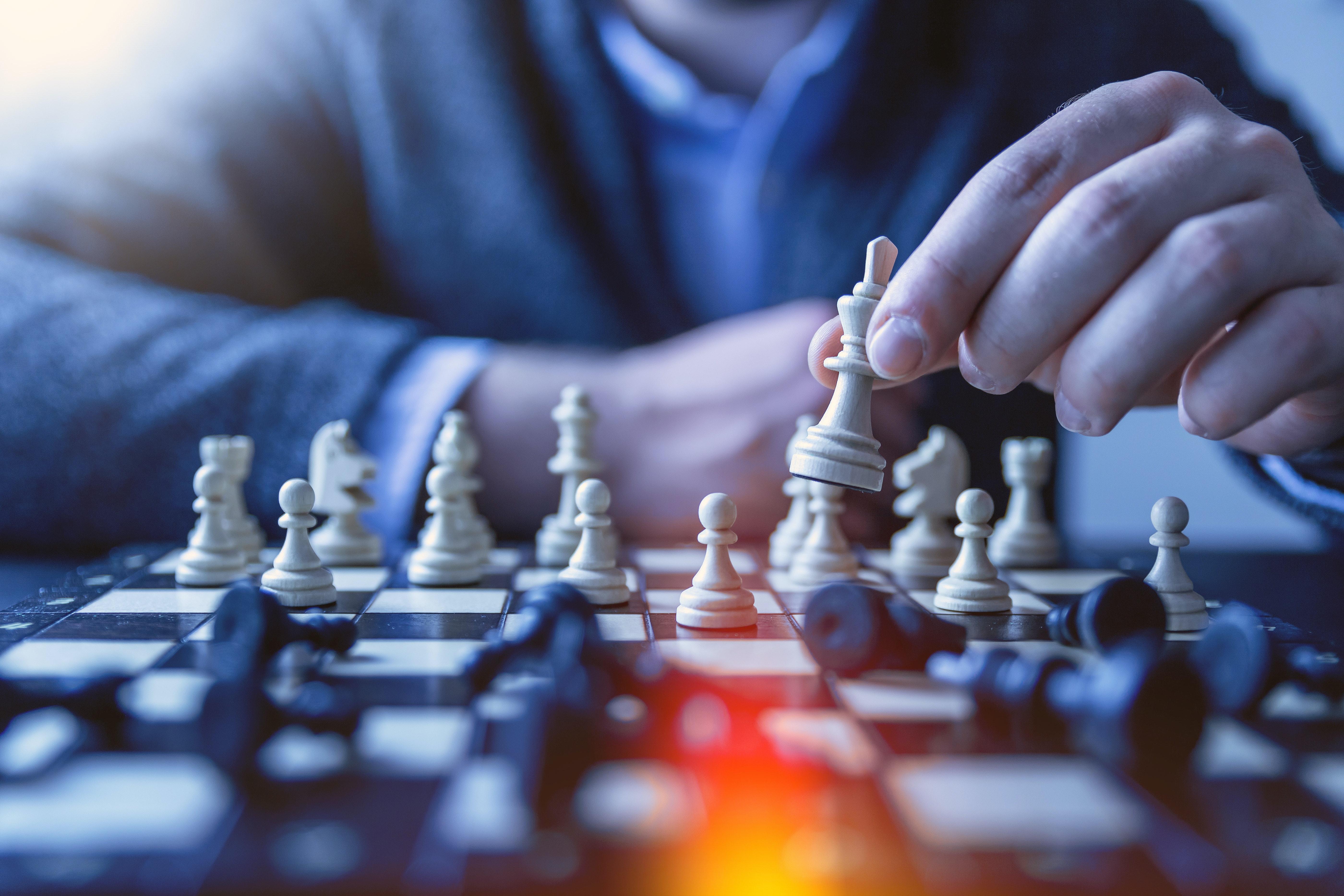 5600x3733 Person Playing Chess · Free