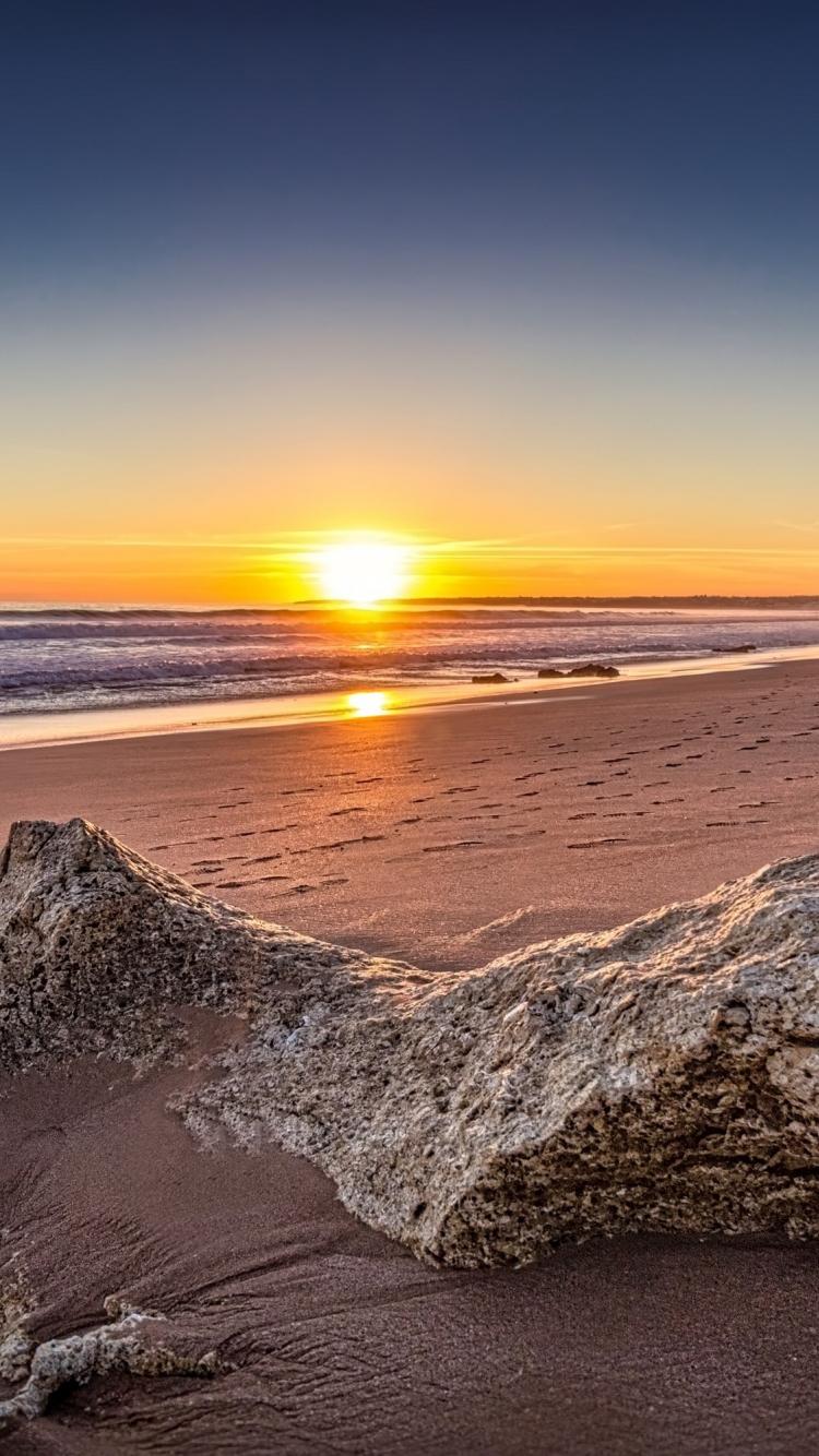 750x1334 Download 750x1334 wallpaper skyline, coast, sand, rocks, beach, sunrise, iphone iphone 750x1334 HD image, background, 3779
