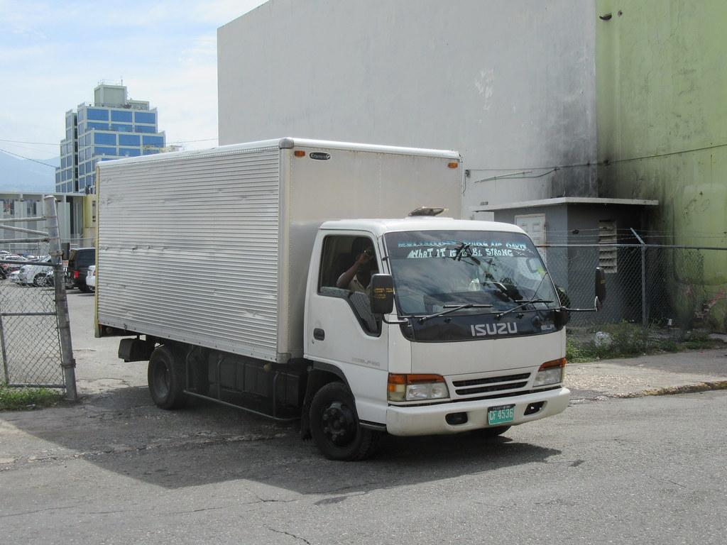 1024x768 Isuzu Elf. Light cabover trucks like this are very common i