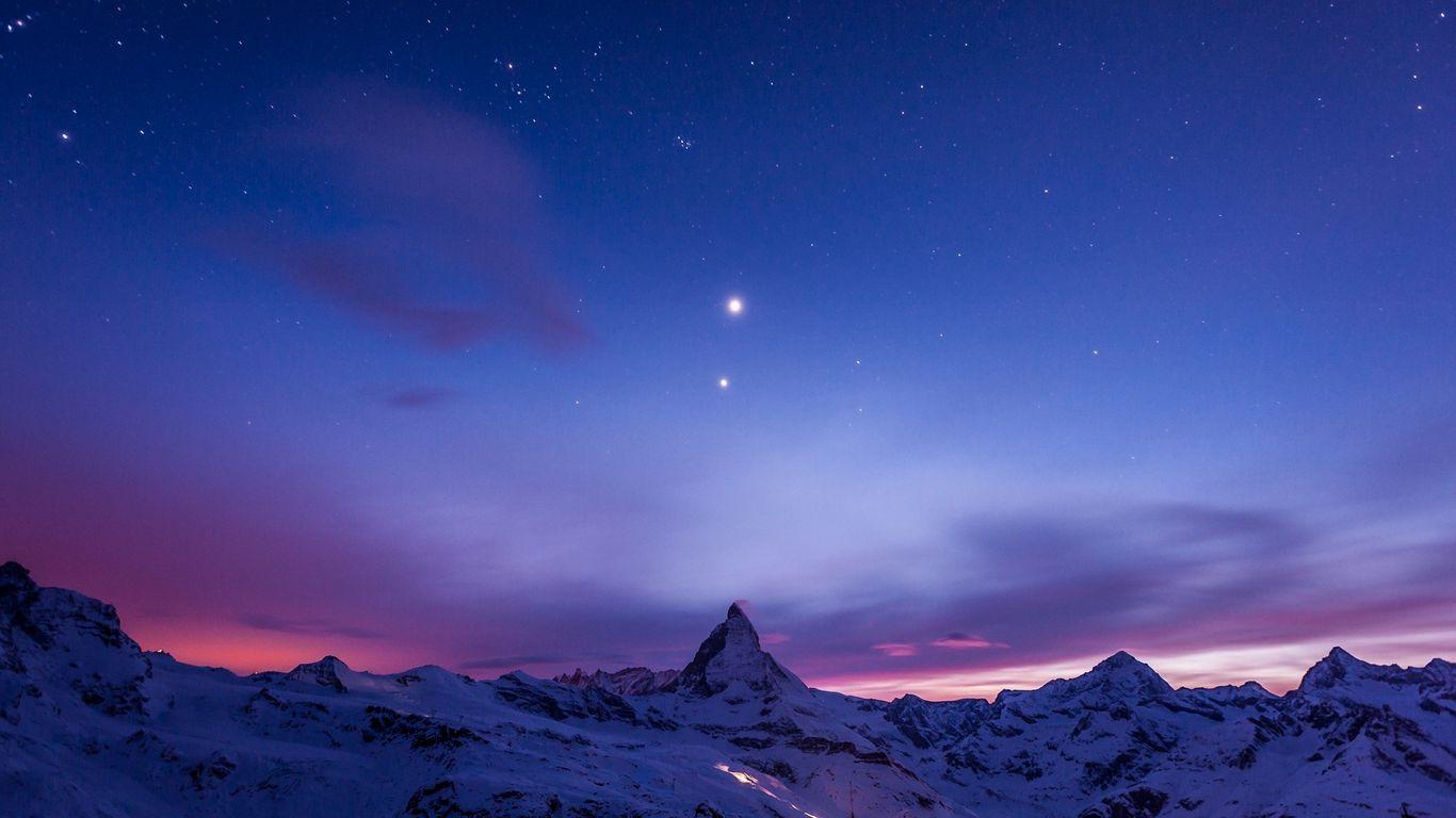 1366x768 Download wallpaper 1366x768 night, mountains, snow, sky, stars tablet, laptop HD background