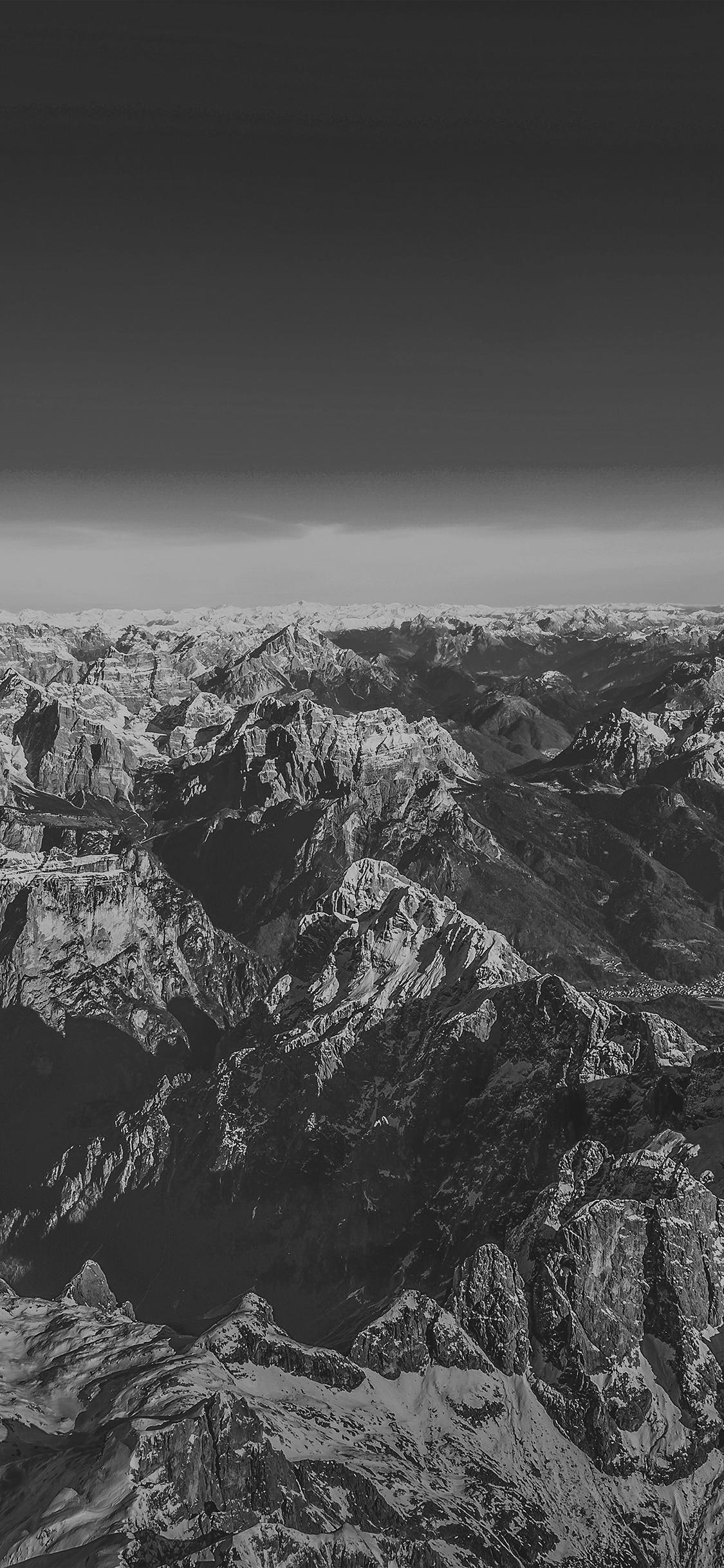 1125x2436 iPhone X wallpaper. winter mountain cold sky blue nature rock fly bw dark