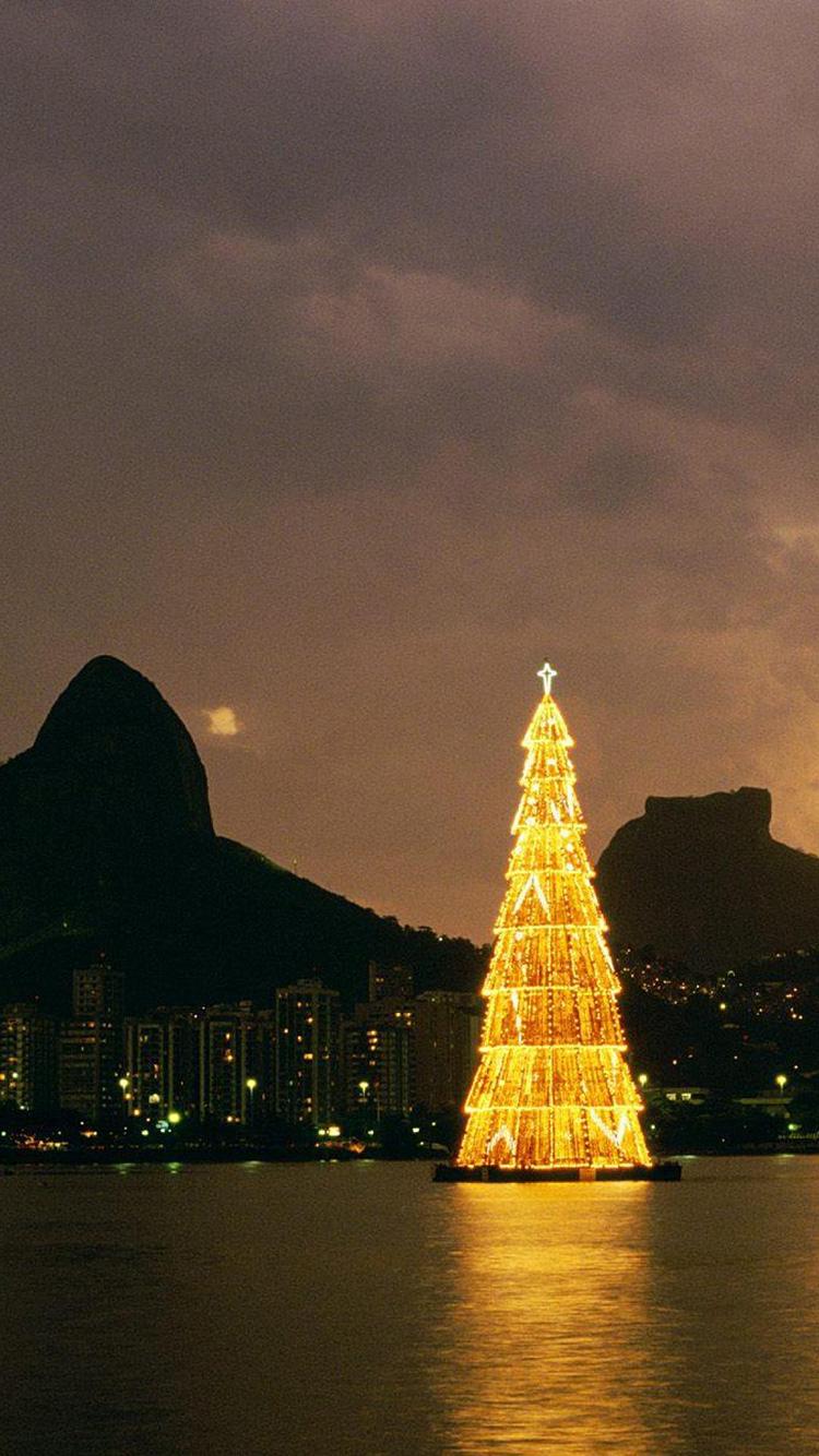 750x1334 Light Tree iPhone 7 Wallpaper Christmas Tree Rio
