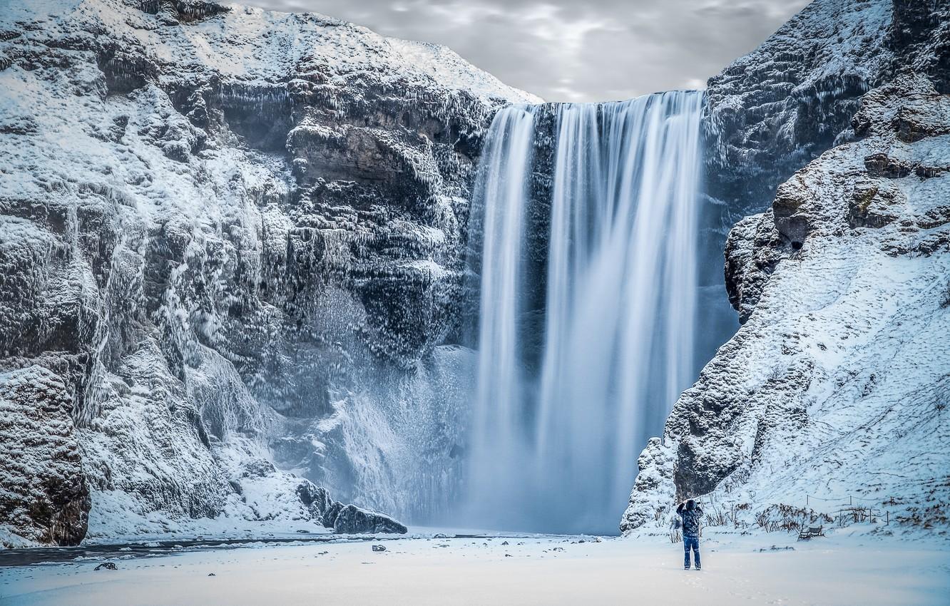1332x850 Wallpaper ice, Winter, river, landscape, nature, water, mountains, rocks, snow, man, waterfall, Iceland, Skogafoss waterfall image for desktop, section пейзажи