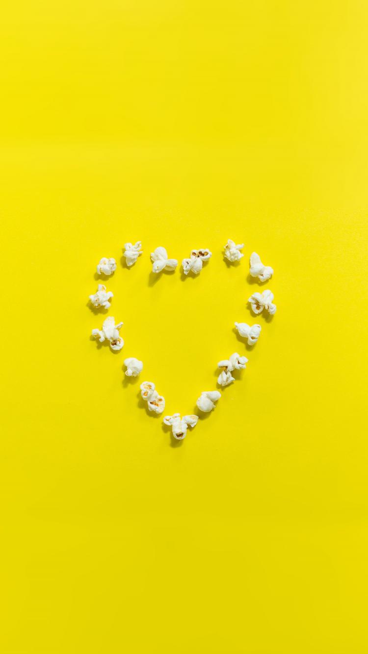 750x1334 Download 750x1334 wallpaper popcorn, heart shape, yellow background, minimal, iphone iphone 750x1334 HD image, background, 18164