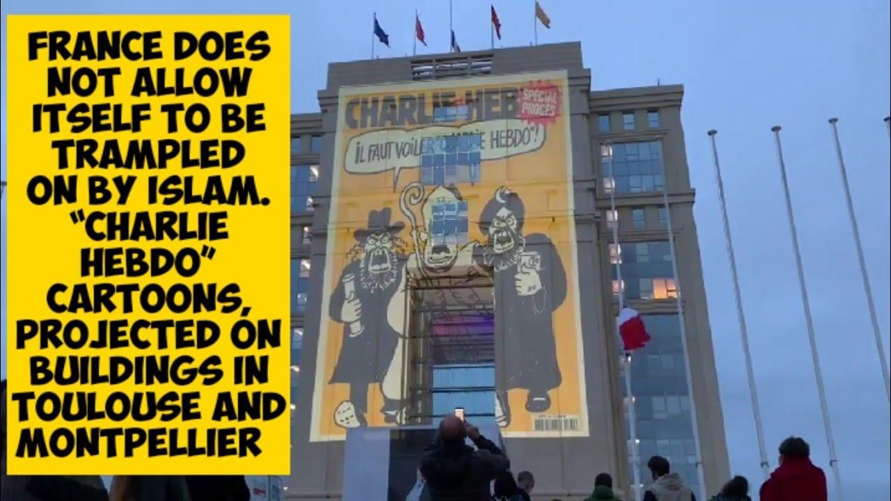 1280x720 Charlie Hebdo cartoons, including one of Mohammed, projected onto Montpellier government building