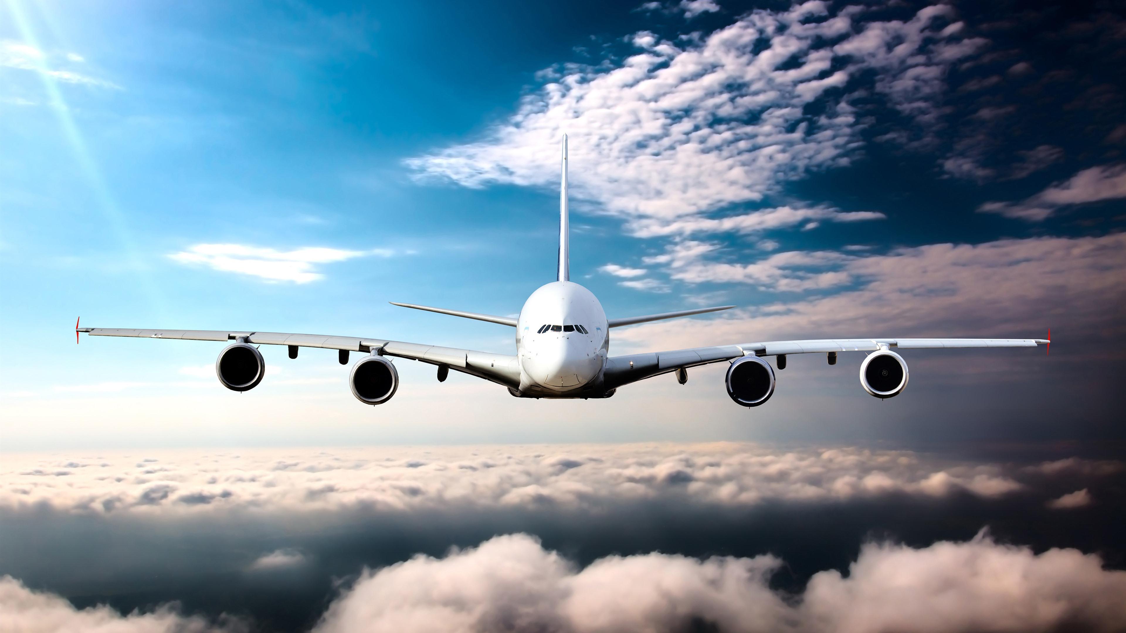 3840x2160 Wallpaper Passenger plane front view, flight, clouds 3840x2160 UHD 4K Picture, Image