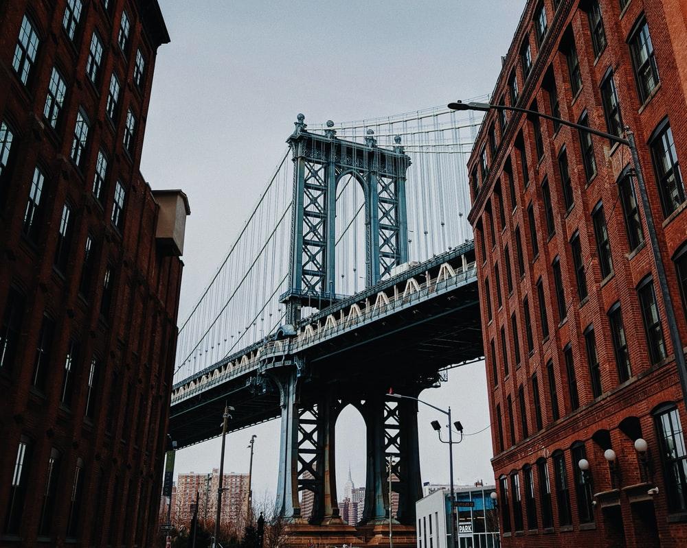 1000x799 gray metal bridge under clear sky photo