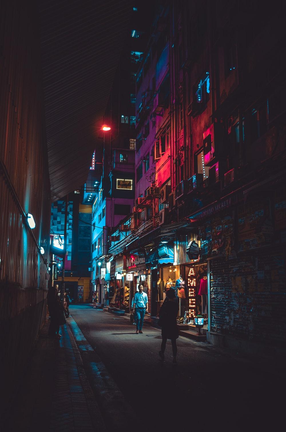 1000x1510 man walking on street photo