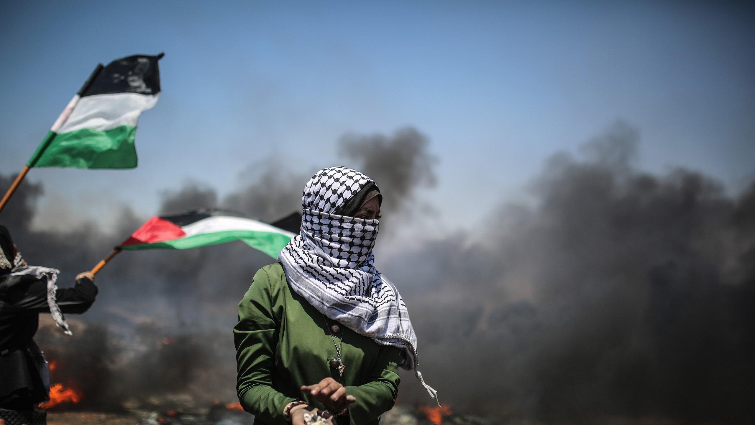 2560x1440 Dozens of Palestinians Were Killed in Protests at an Israeli Border Fence in the Gaza Strip, Reports Say