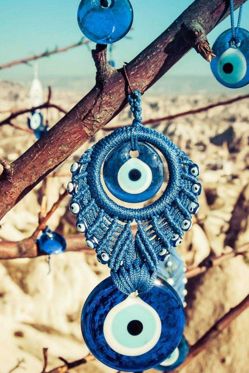 853x1280 Evil Eye Wallpaper