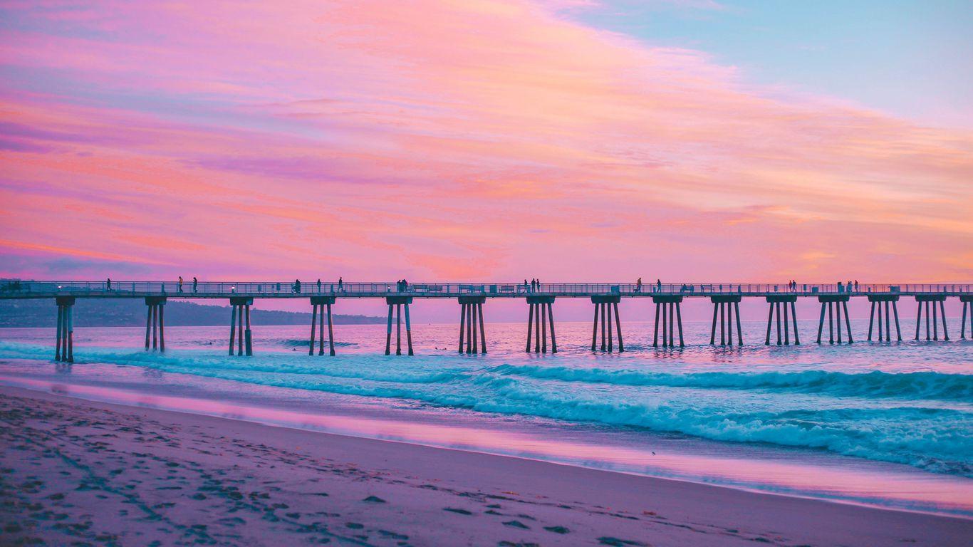 1366x768 Download wallpaper 1366x768 pier, sea, surf, pink, hermosa beach, california tablet, laptop HD background