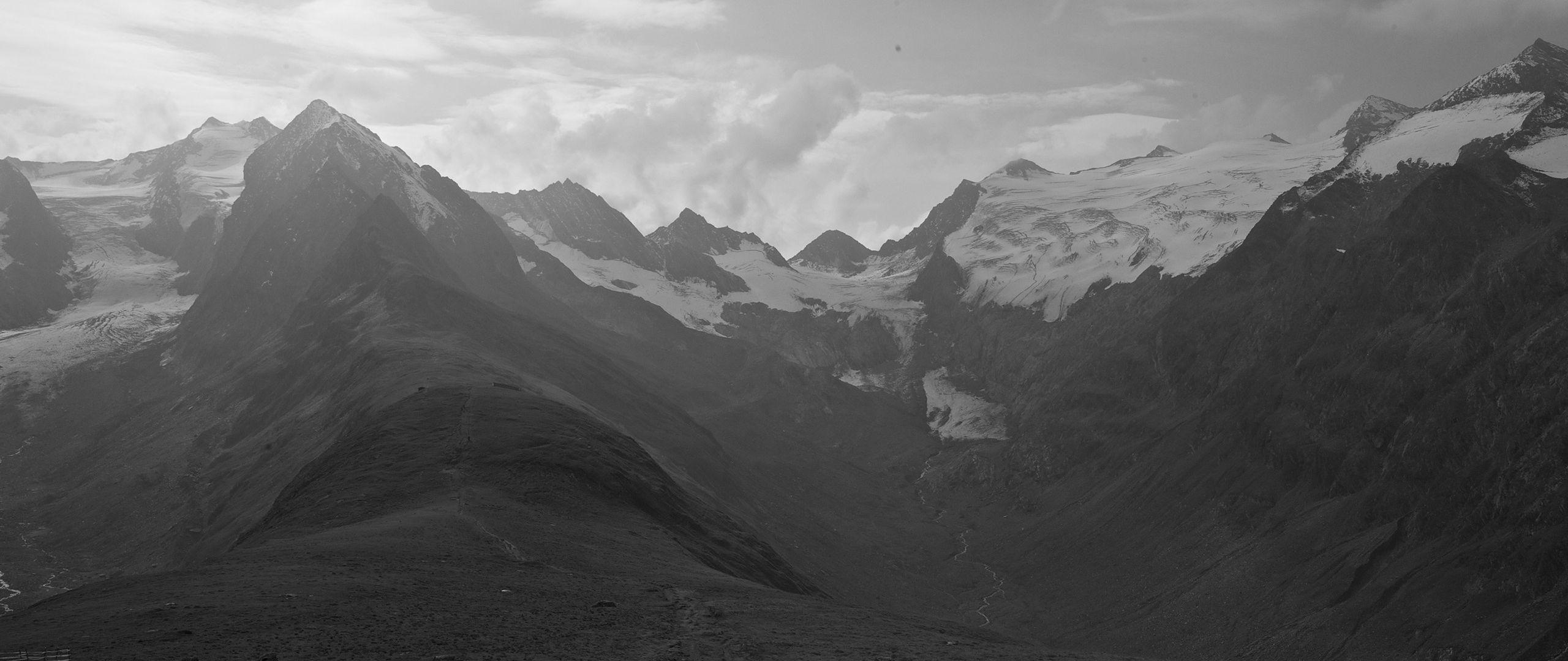 2560x1080 Download wallpaper 2560x1080 mountains, distance, sky, black and white dual wide 1080p HD background