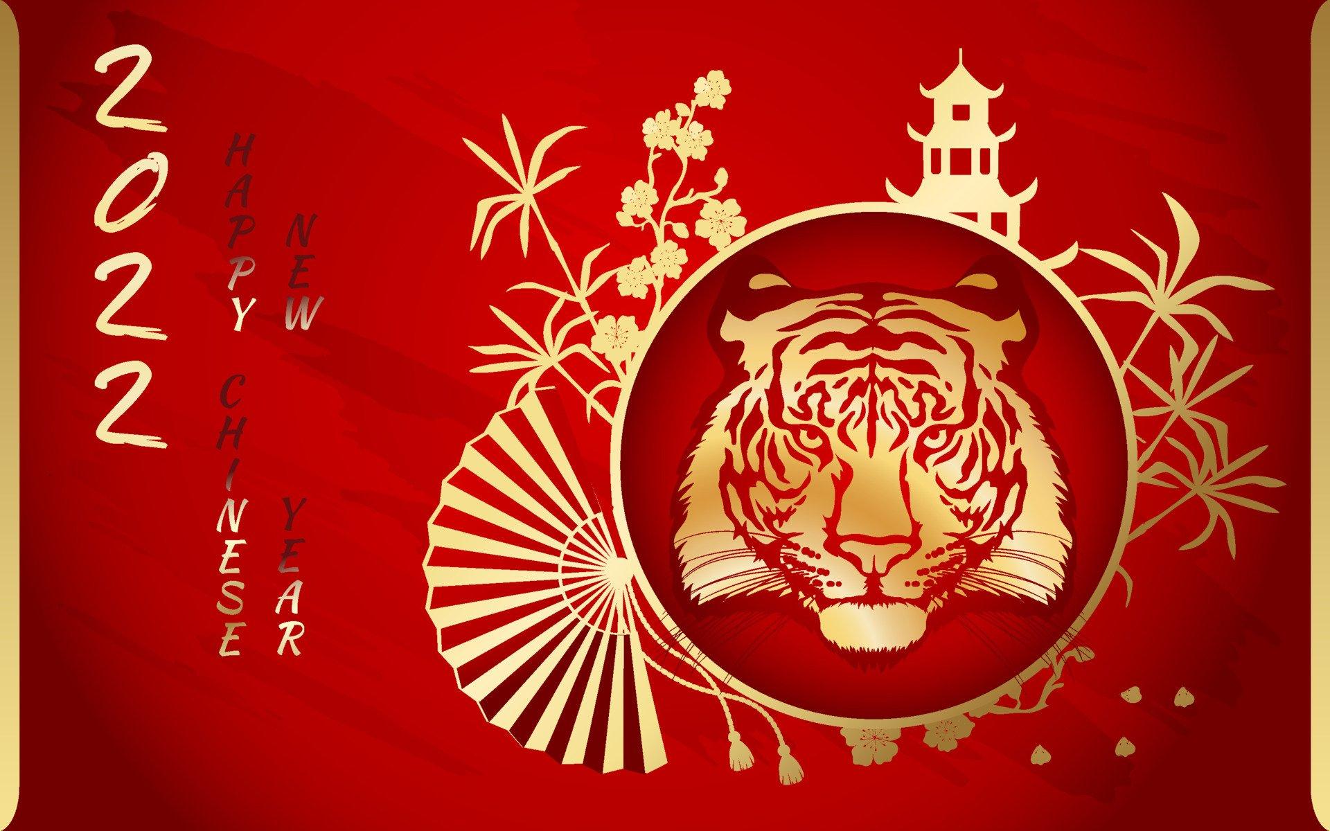 1920x1200 Tiger with gold on the background of a Chinese pagoda, bamboo, sakura and a fan. Happy Chinese New Year 2022. Year 2022 symbol with text