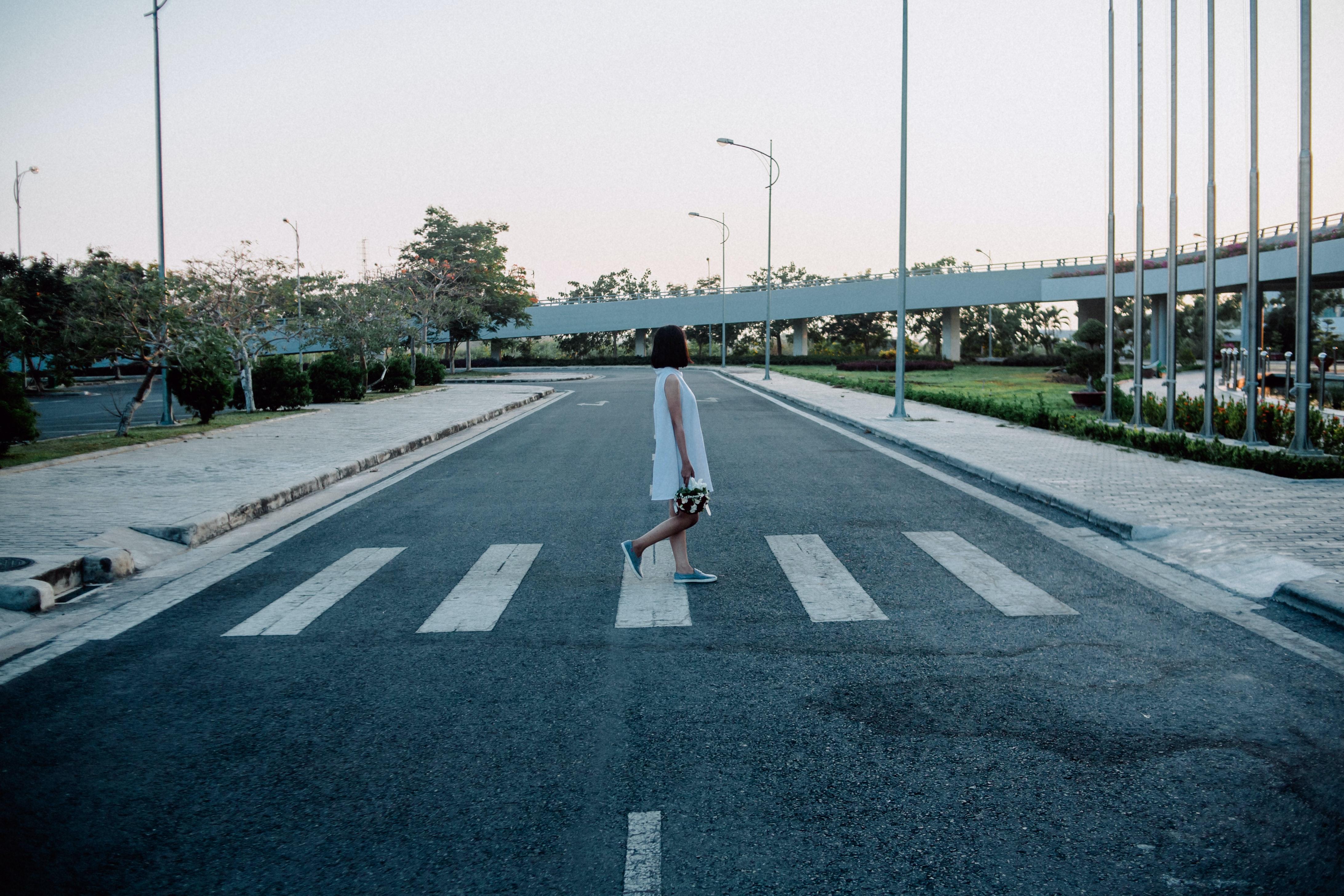 4368x2912 Woman Standing on Gray and White Road Crosswalk · Free