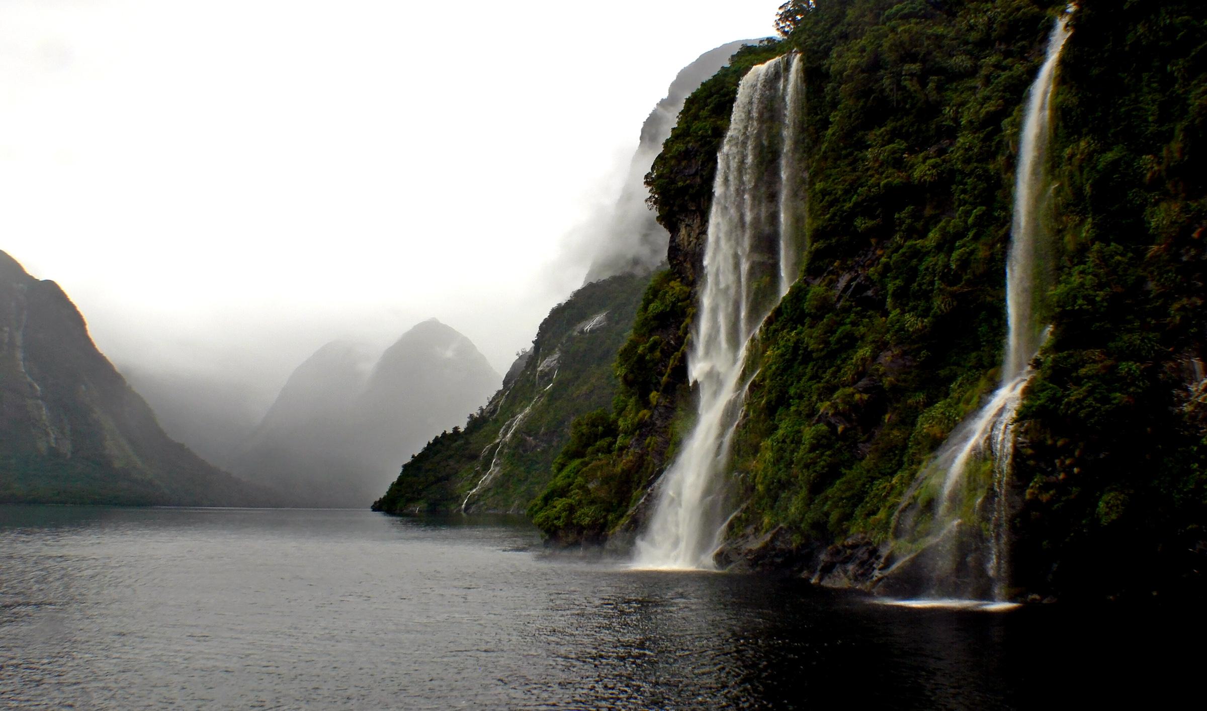2400x1415 Free Image : landscape, sea, coast, nature, rock, waterfall, cliff, weather, bay, fjord, terrain, body of water, nationalpark, mountains, cliffs, newzealand, waterfalls, flickrelite, nikonflickraward, fiordlandnationalpark, doubtfulsound, water