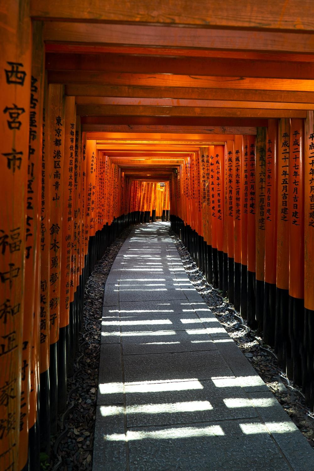 1000x1500 empty tunnel between red walls photo
