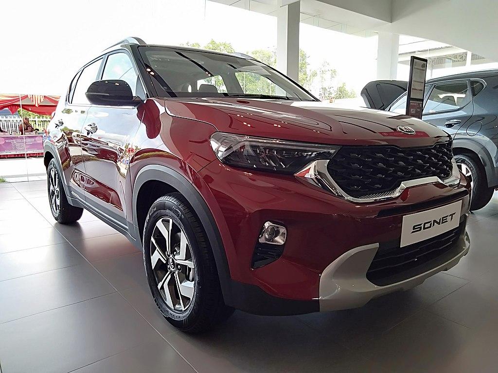 1024x768 Kia Sonet GLS 1.5AT red and black front view in