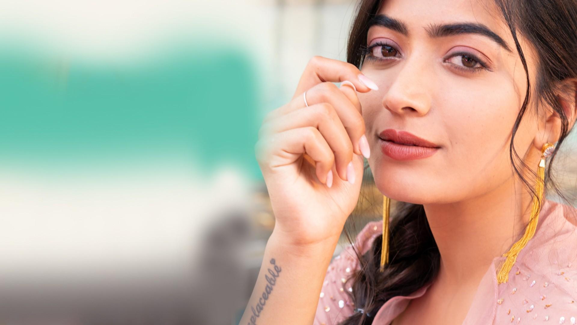 1920x1080 Beautiful Rashmika Mandanna Is Wearing Peach Color Dress HD Girls Wallpaper