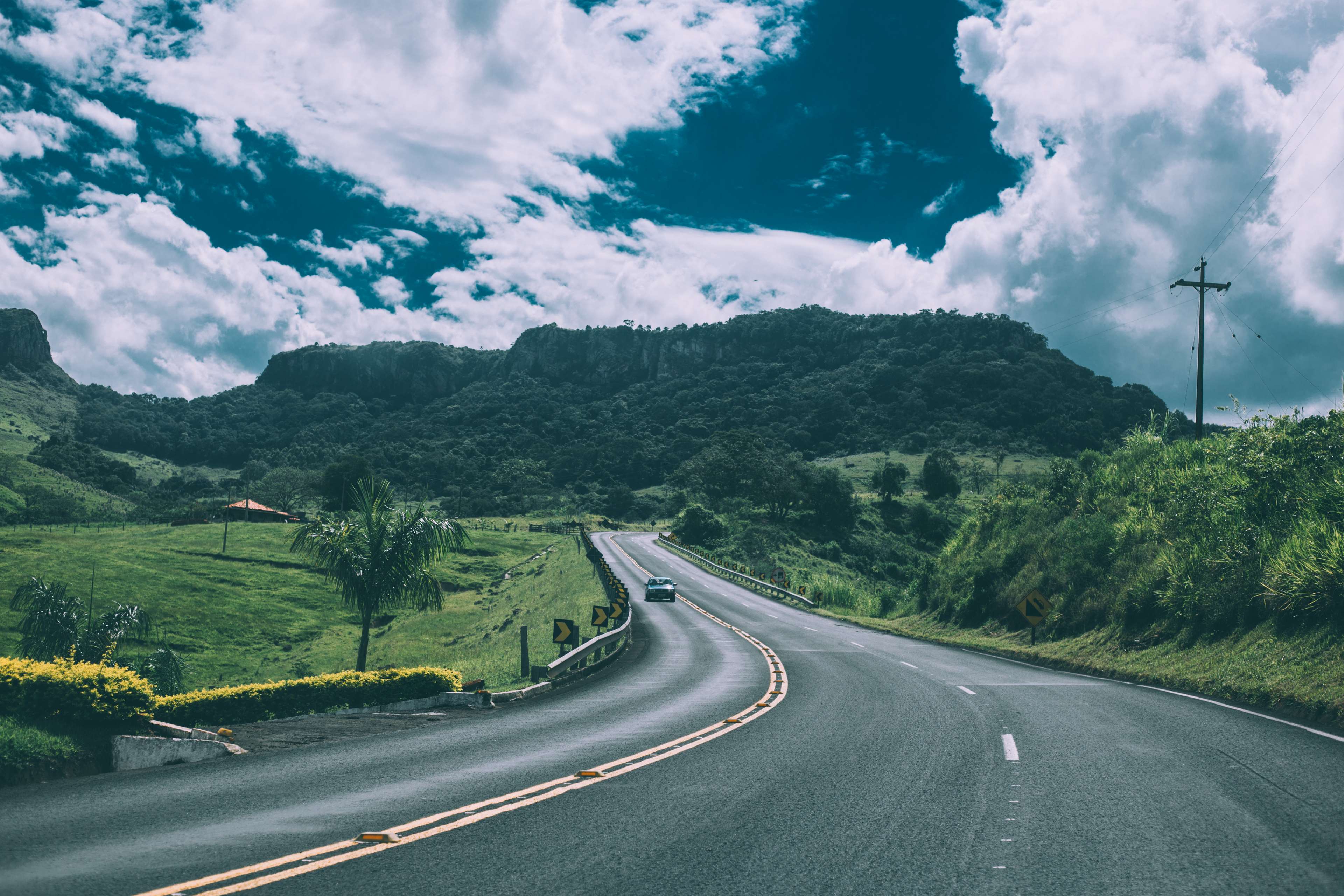 3840x2560 car, clouds, countryside, fields, grass, mountains, power lines, road, street, tarmac 4k wallpaper