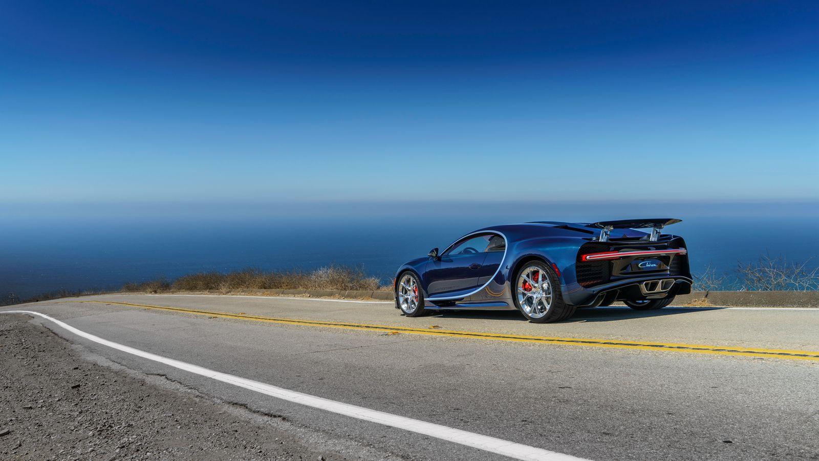 1600x900 Download wallpaper 1600x900 bugatti, chiron, side view, road widescreen 16:9 HD background