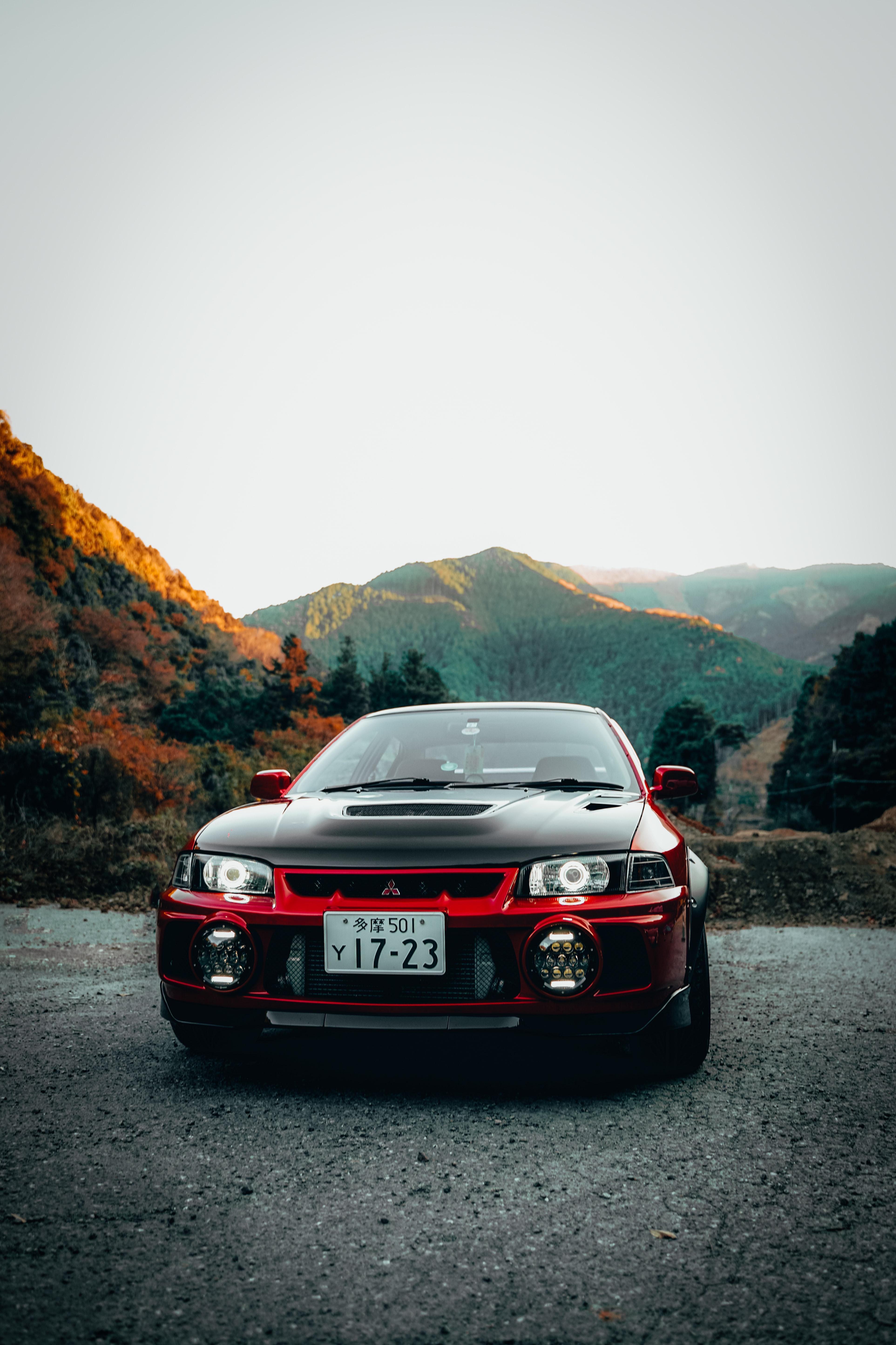 3849x5773 Download wallpaper 3849x5773 mitsubishi lancer evolution, mitsubishi, car, red, black, front view HD background