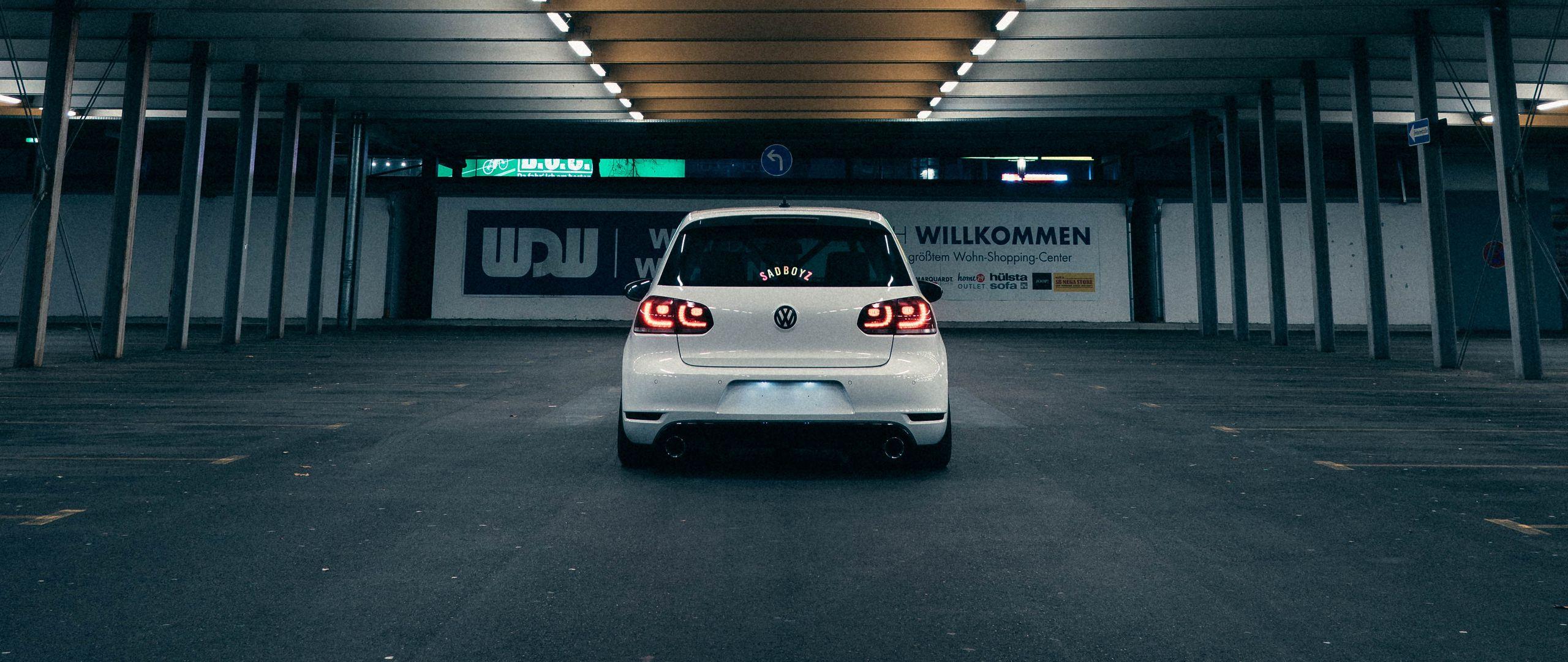 2560x1080 Download wallpaper 2560x1080 volkswagen golf gti, volkswagen, car, white, rear view dual wide 1080p HD background