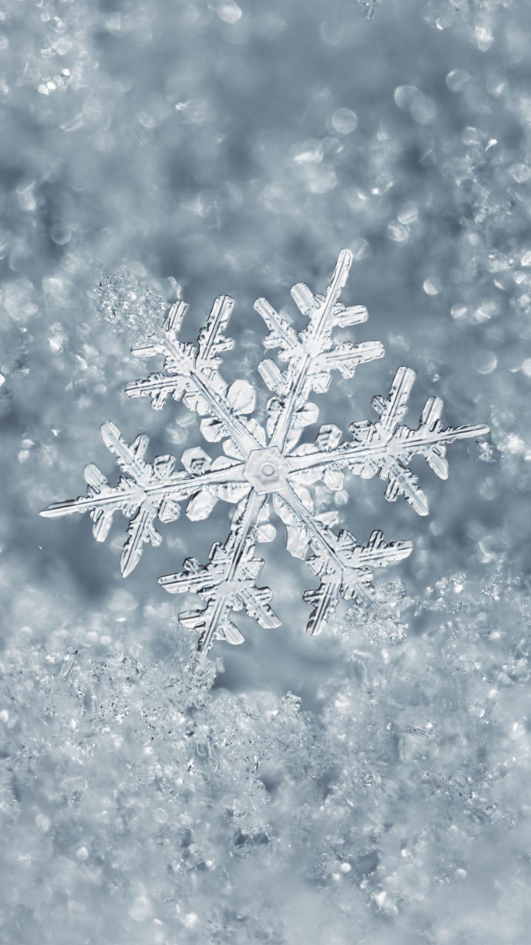 Falling snowflakes wallpapers to match iPhone 13 Pro colors