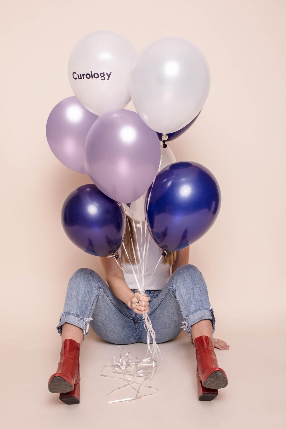 1000x1500 Woman Holding Six Assorted Color Balloons Photo