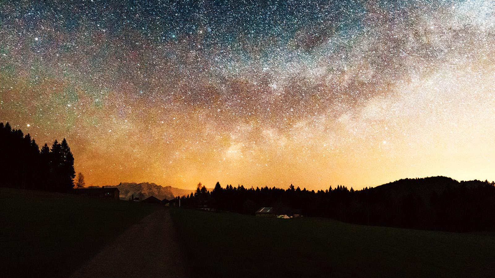 1600x900 Starry Sky Nature Sunset Mountain Road Night Wallpaper