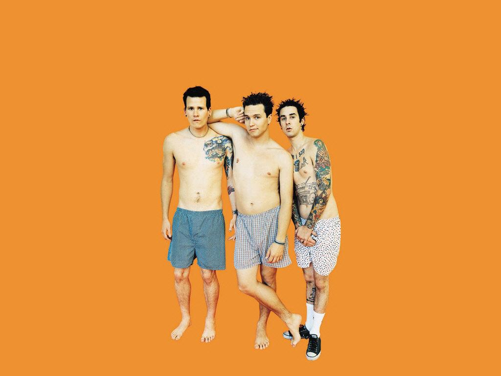 1024x768 Travis Barker Says Tom DeLonge Should 'Man Up And Quit' Blink 182. Music News About HER