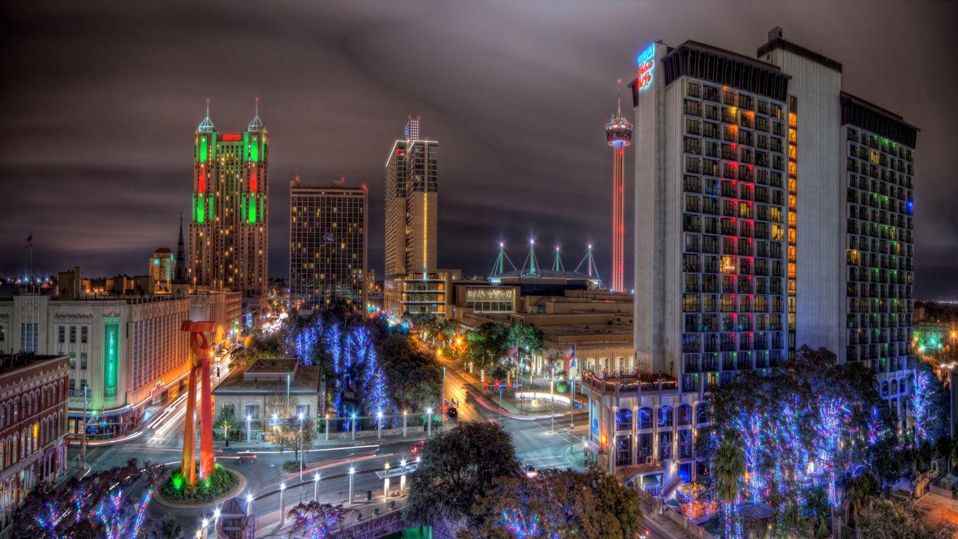 1366x768 Download wallpaper 1366x768 san antonio, texas, night, colorful, trees, city beautification tablet, laptop HD background