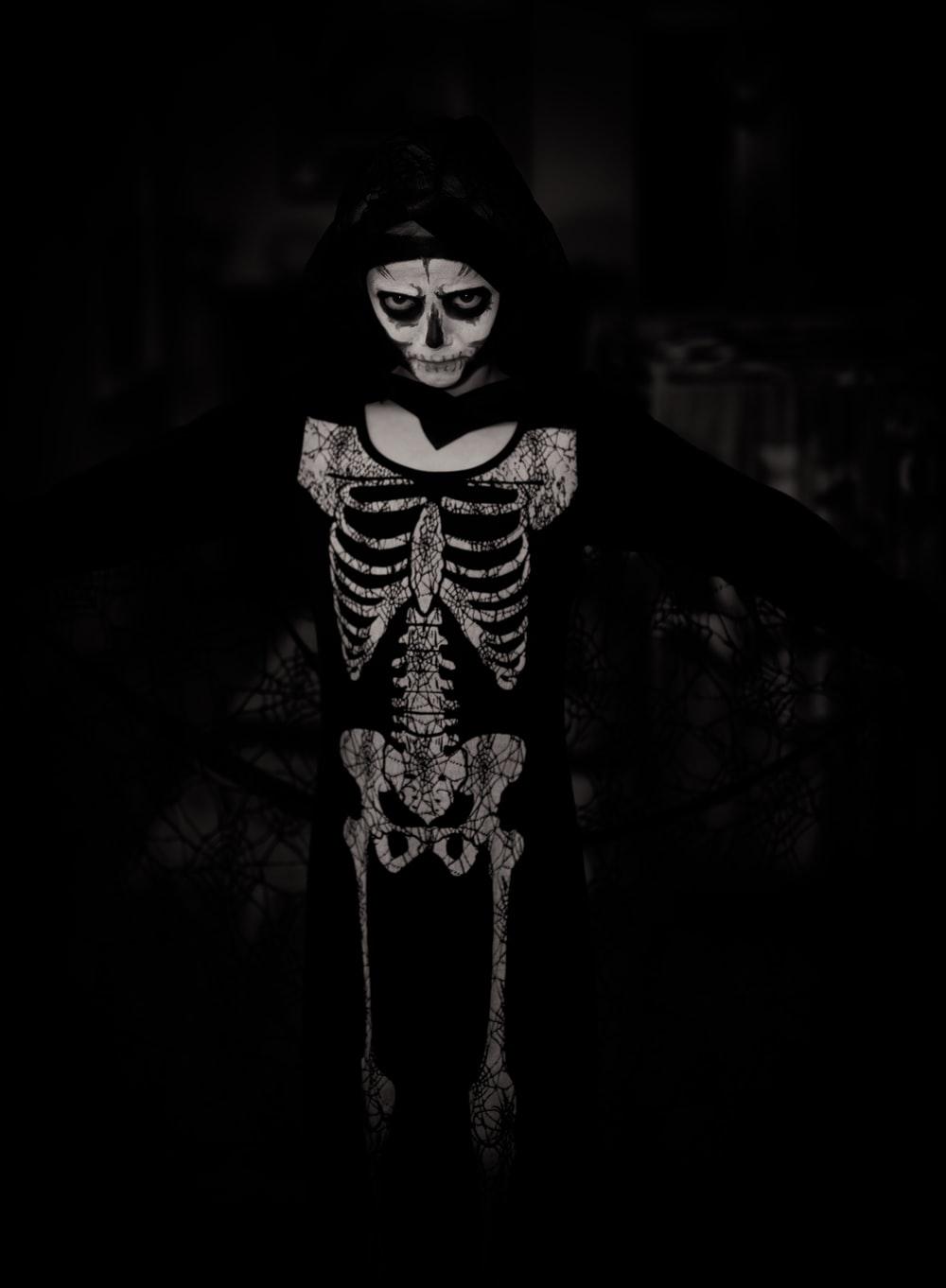 1000x1362 person wearing skeleton costume photo