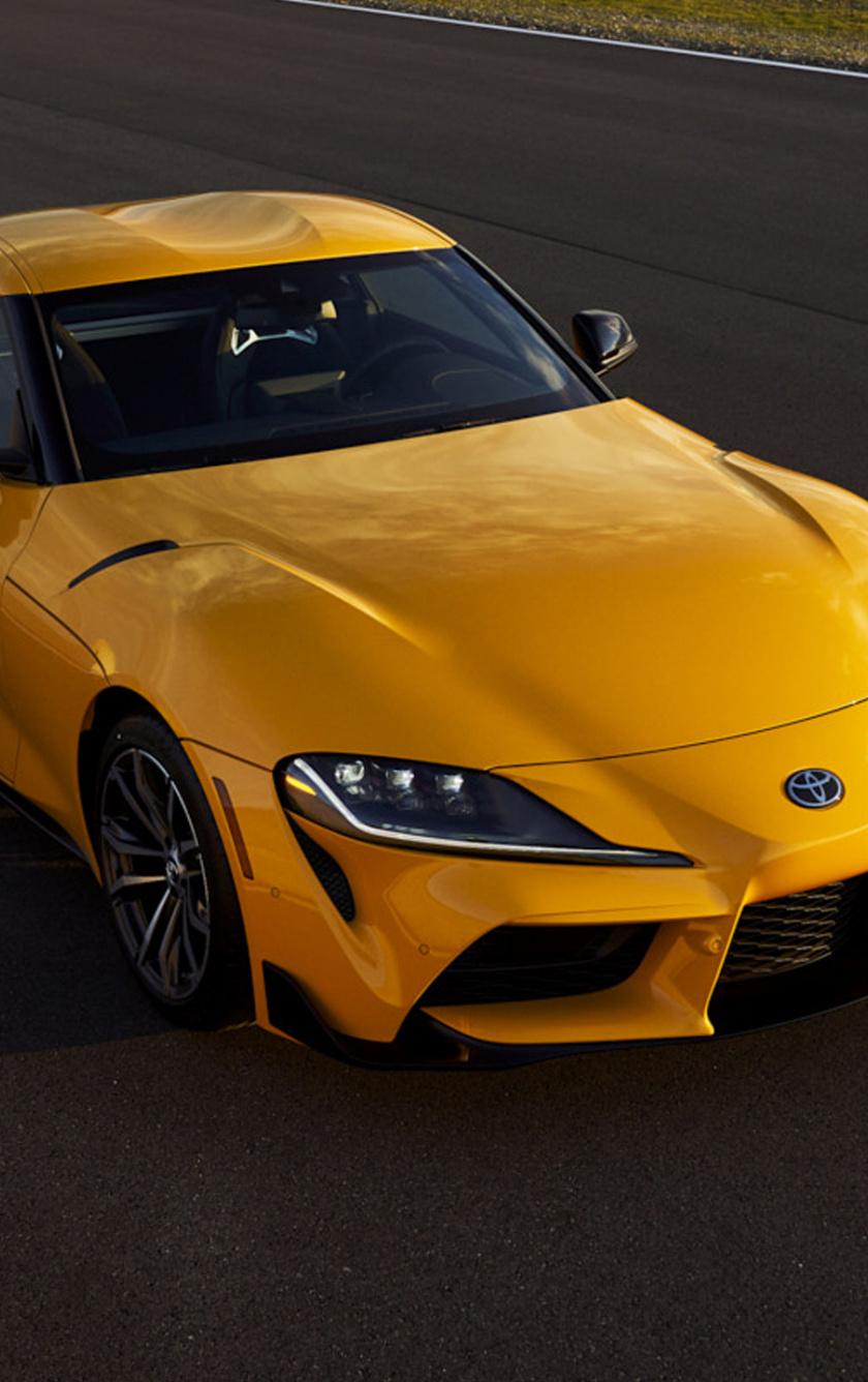 840x1336 Download 2021 Toyota GR Supra, yellow car wallpaper, 840x iPhone iPhone 5S, iPhone 5C, iPod Touch