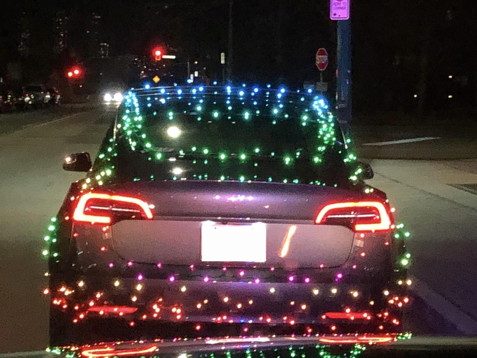 1600x1200 Tesla Owner Ticketed For Duct Taping Christmas Lights To His Car