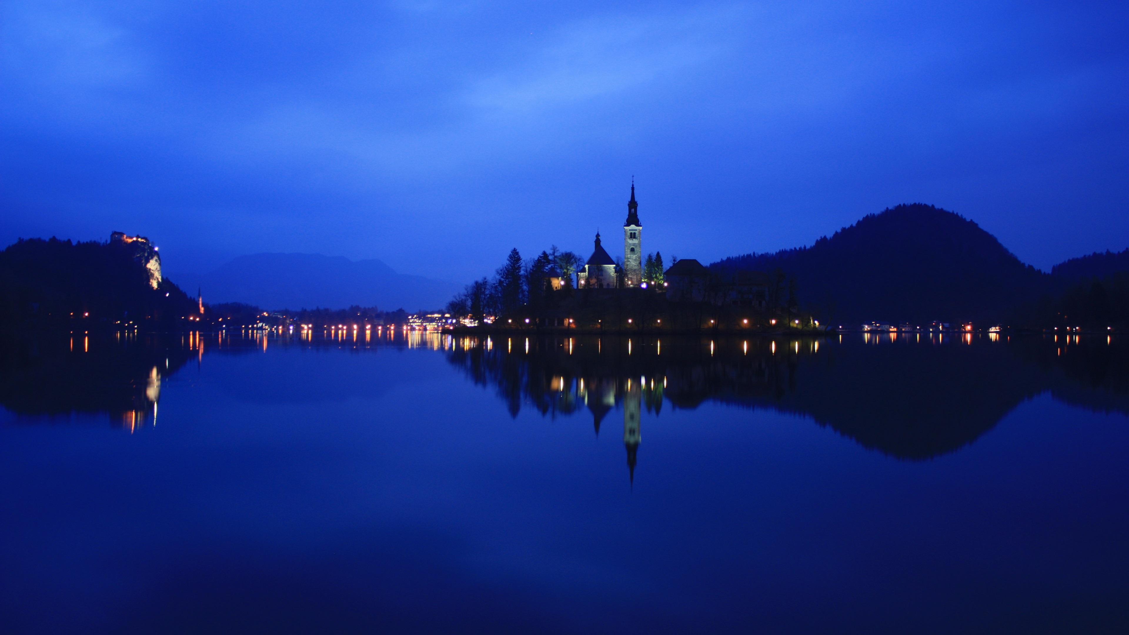 3840x2160 Wallpaper Lake Bled in Slovenia, night, lights, water reflection 3840x2160 UHD 4K Picture, Image