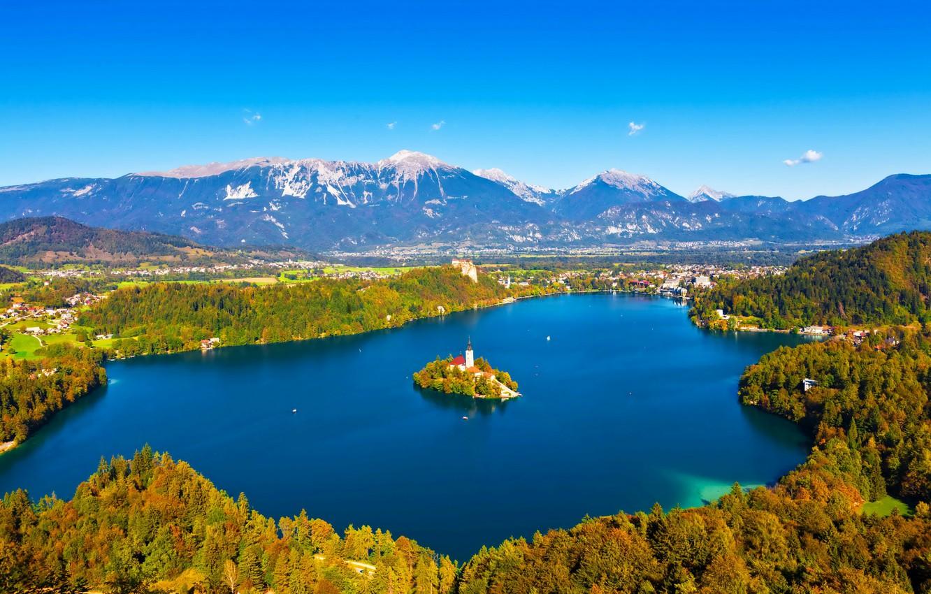 1332x850 Wallpaper autumn, trees, mountains, lake, island, home, Church, panorama, Sunny, the view from the top, Slovenia, Bled image for desktop, section пейзажи