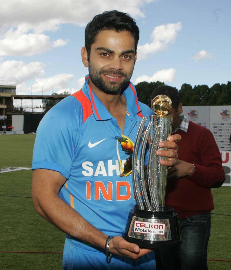 900x1050 Virat Kohli With Cup Wallpaper Kohli With Trophy