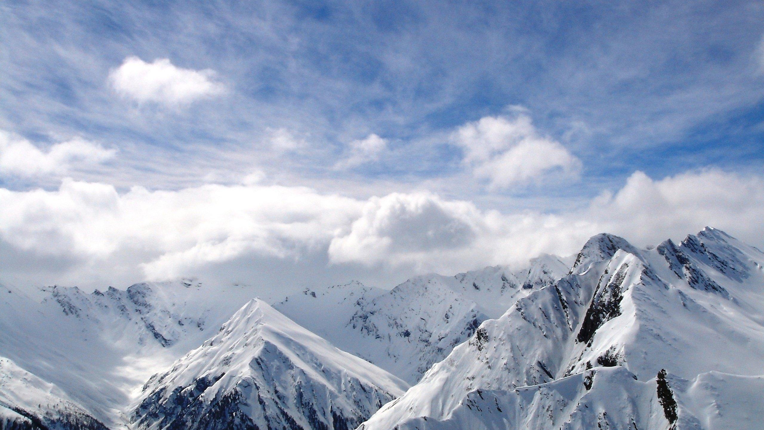 2560x1440 Snow Mountains With Clouds