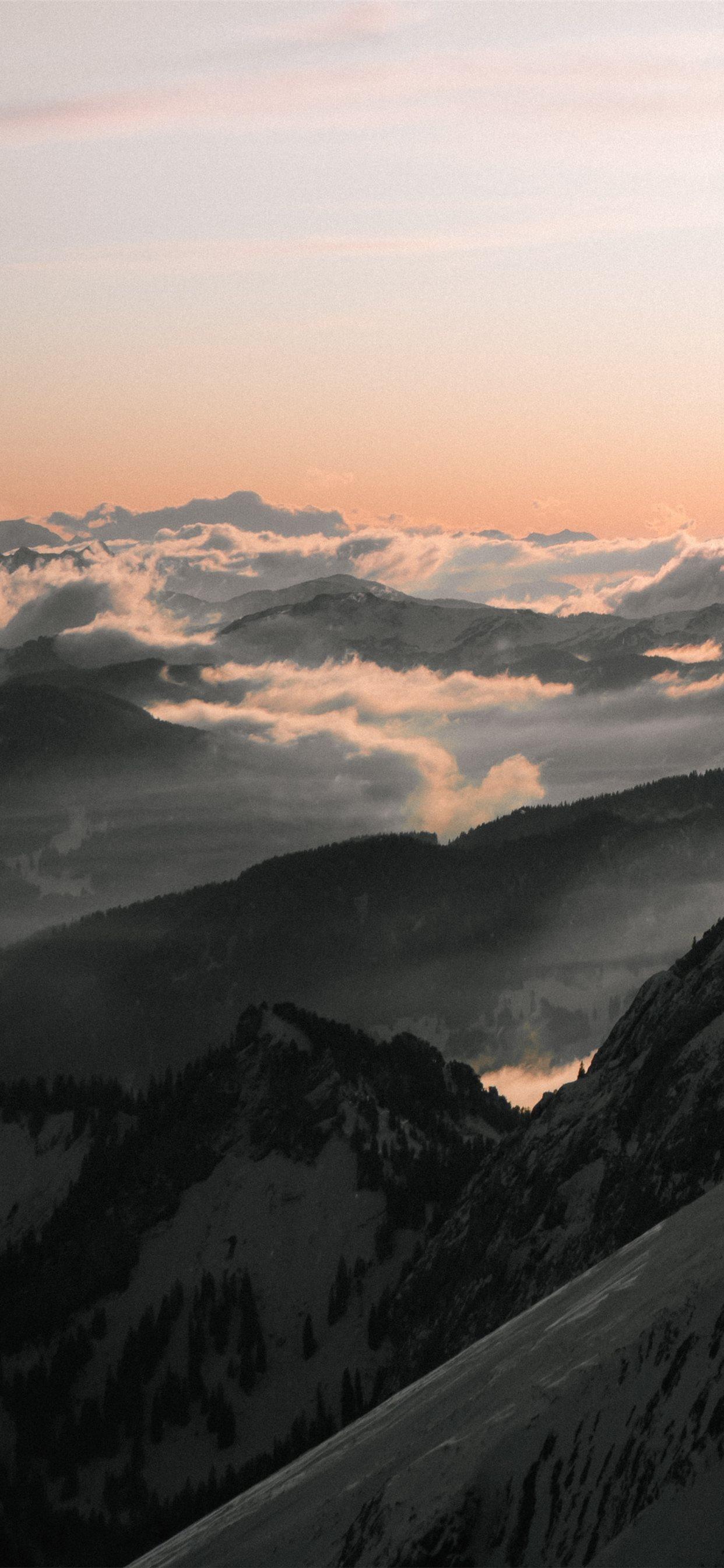 1242x2688 black and white mountains under white clouds durin. iPhone X Wallpaper Free Download