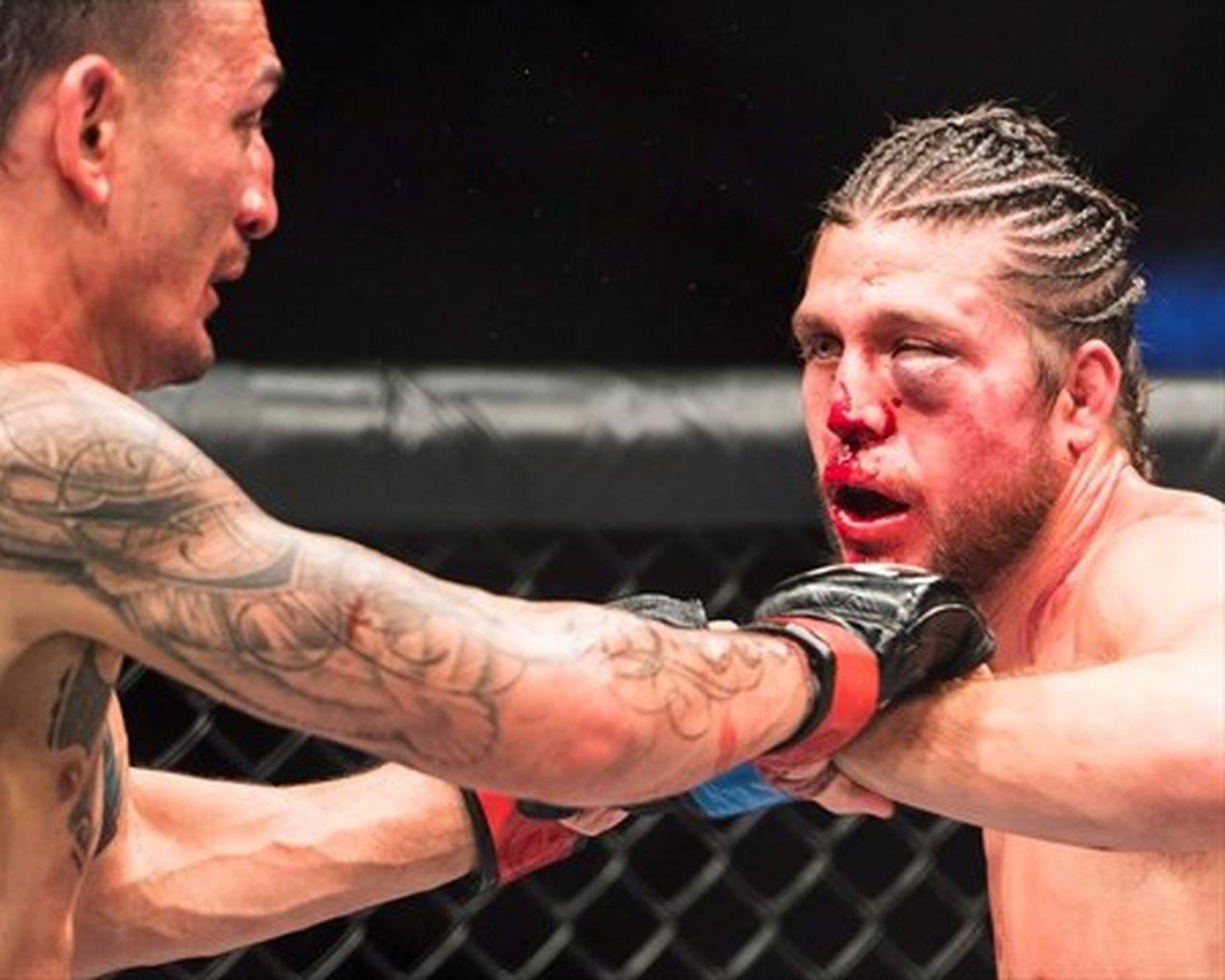 1280x1024 Featherweight champ Max Holloway smashes records with bloody UFC 231 win