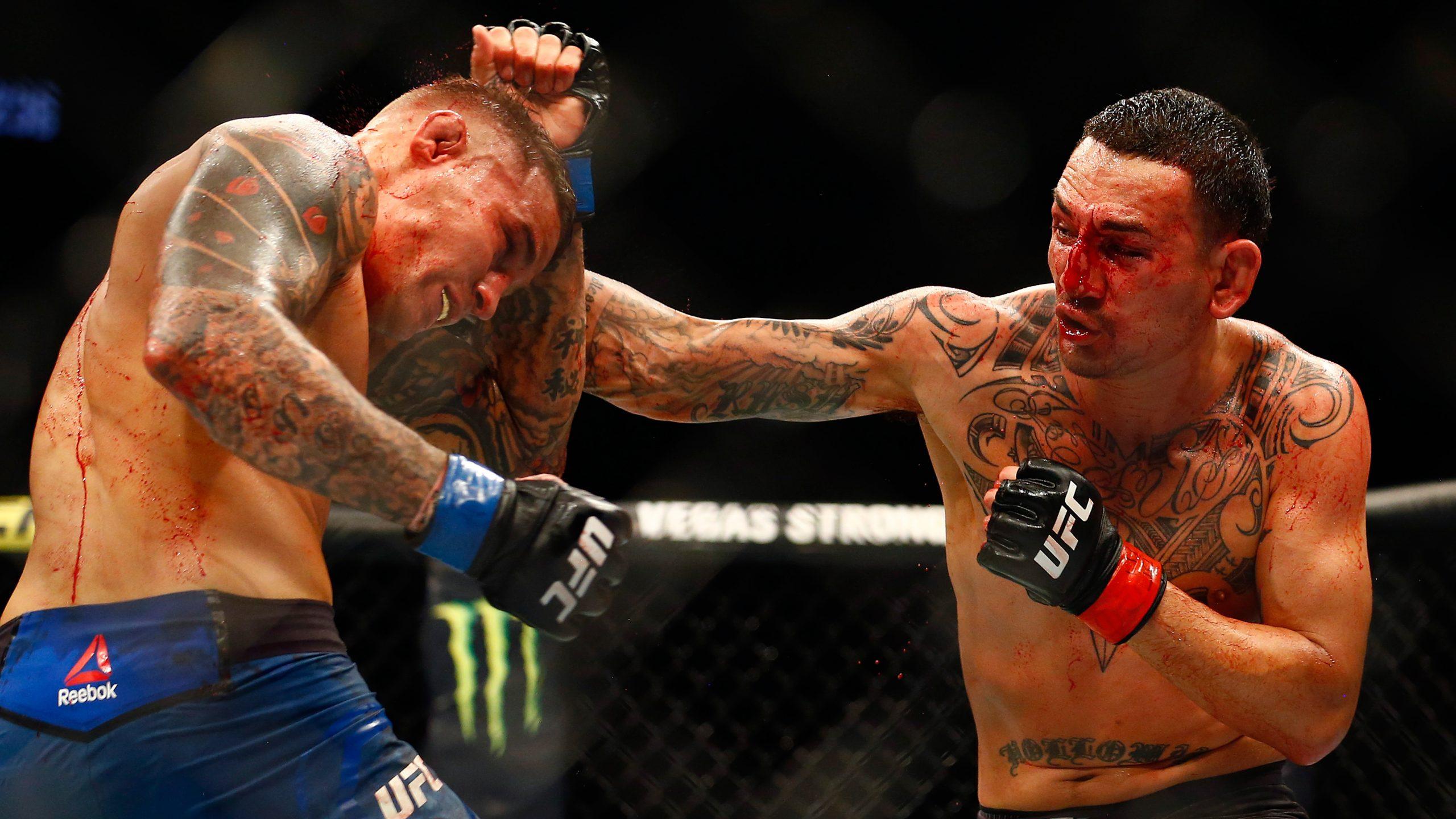 2560x1440 Poirier bloodies Holloway, wins UFC interim lightweight belt