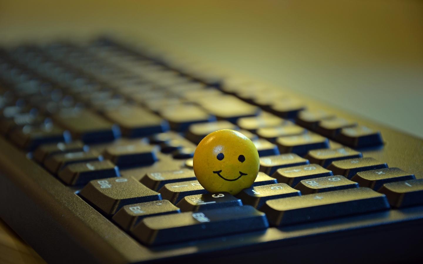 1440x900 Yellow smiley face on black keyboard Desktop wallpaper 1440x900