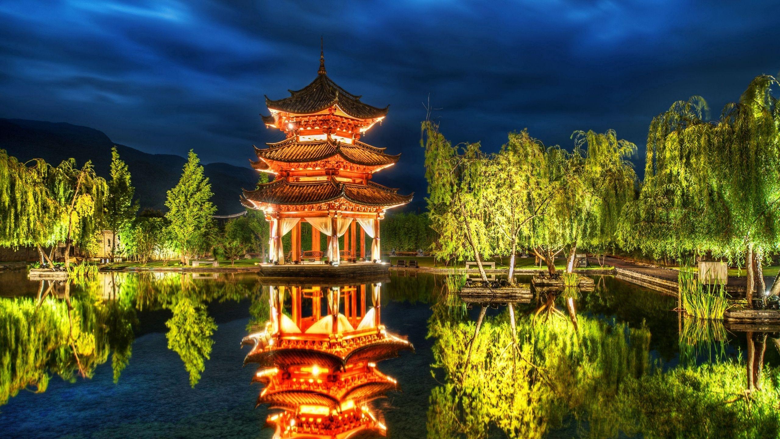 2560x1440 Download wallpaper 2560x1440 china, forest, lake, night, sky, pagoda widescreen 16:9 HD background